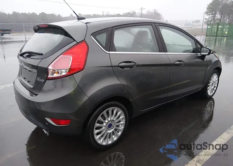 2016 Ford Fiesta Titanium z USA, uszkodzony, nr VIN 3FADP4FJ9GM188356
